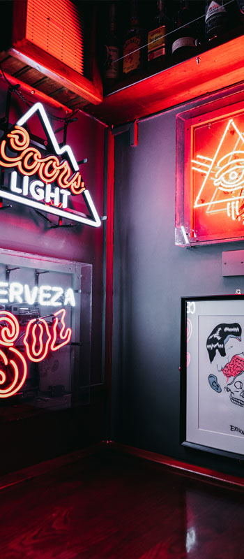 photograph of neon lights in a bar